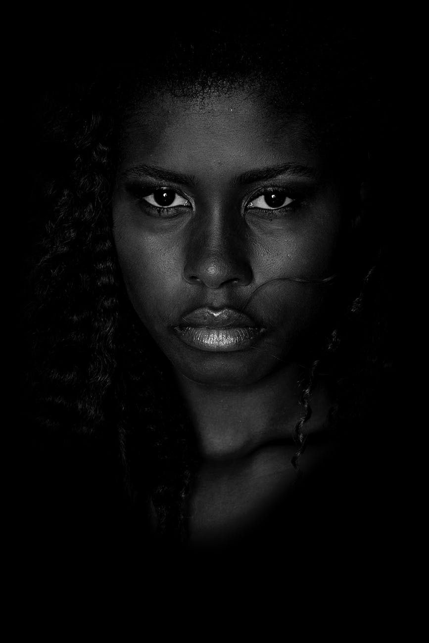 grayscale photography of woman s face